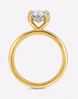 hidden halo oval cut gold engagement ring