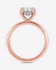 hidden halo oval cut gold engagement ring