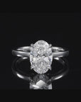hidden halo oval cut gold engagement ring